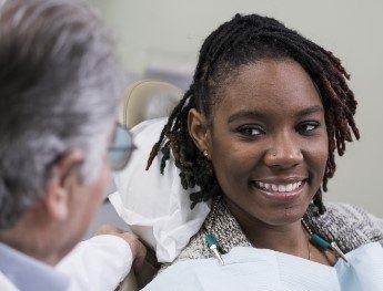 patient smiling in dental chair in Morgan Hill